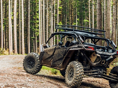Driving through a wooded area in a UTV